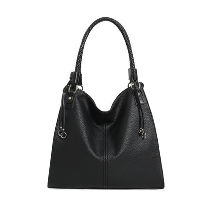 groß schwarze Damen Einkaufstasche-Shopper mit schönen Griffen im Webdesign und Metaldesigndetails