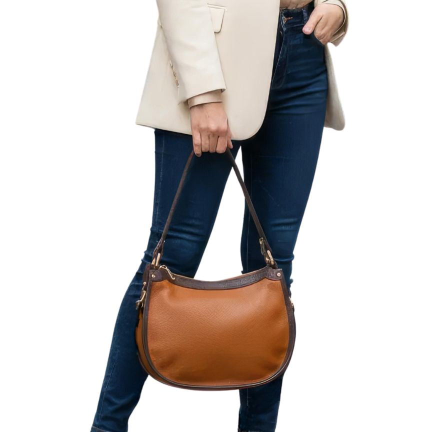 Elegante, mittelgroße, zweifarbige Lederhandtasche mit verlängertem Riemen