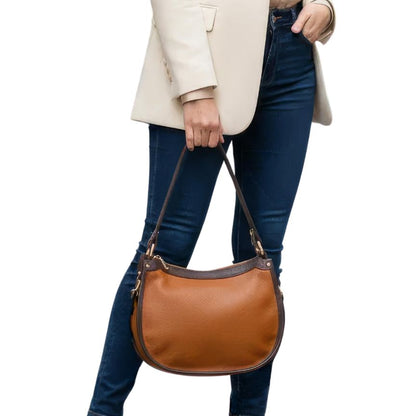 Elegante, mittelgroße, zweifarbige Lederhandtasche mit verlängertem Riemen