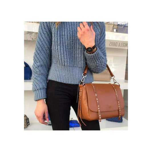Elegante Leder Tasche mit Handgriff und Schultergurt am Arm getragen
